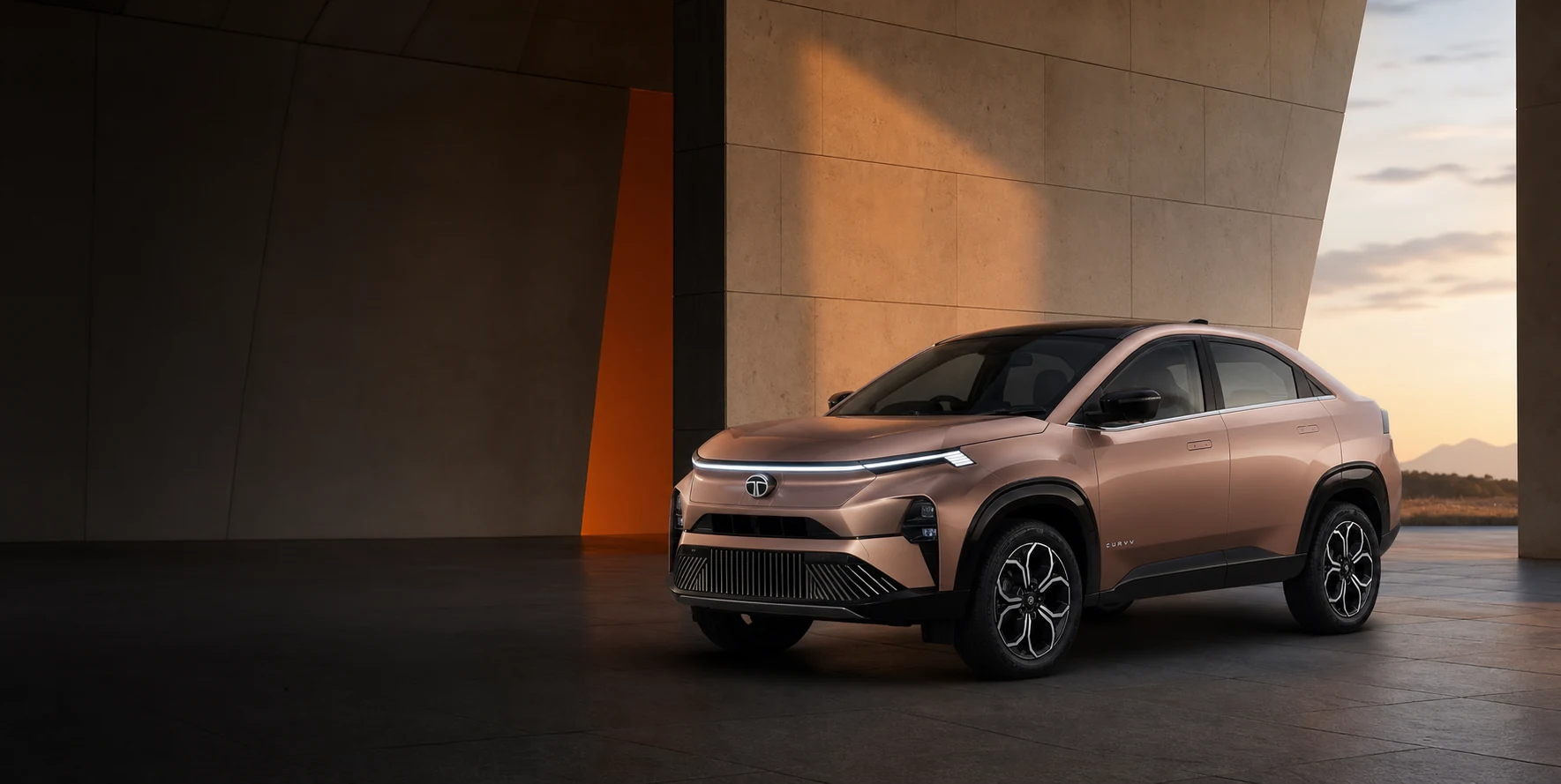 Tata Curvv EV in a modern architectural pavilion