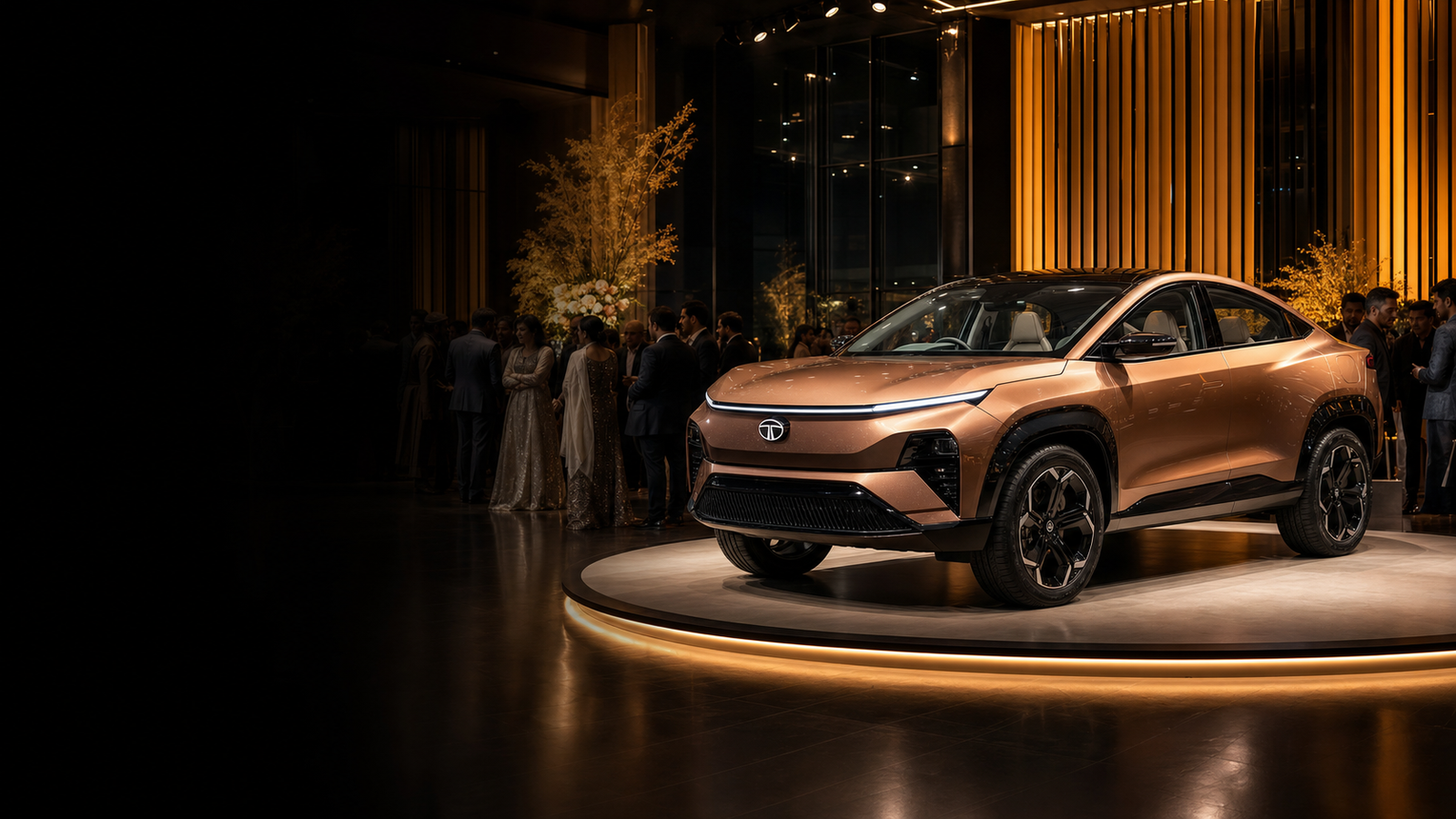 A bronze Tata vehicle at a premium KAMU Motors reveal event